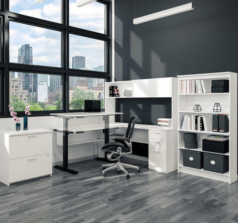 4-Piece set including a standing desk, a credenza desk with hutch, a lateral file cabinet, and a bookcase
