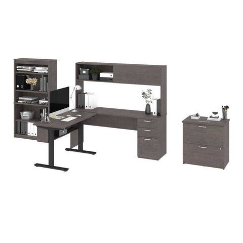 4-Piece set including a standing desk, a credenza desk with hutch, a lateral file cabinet, and a bookcase